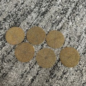 Nwot set of six coasters exquisite beaded gold.  Great for the holidays.